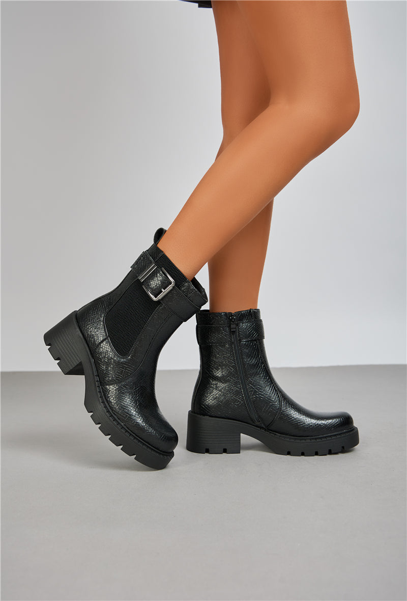 Bottines Chelsea avec boucle et semelle crantée, Noir