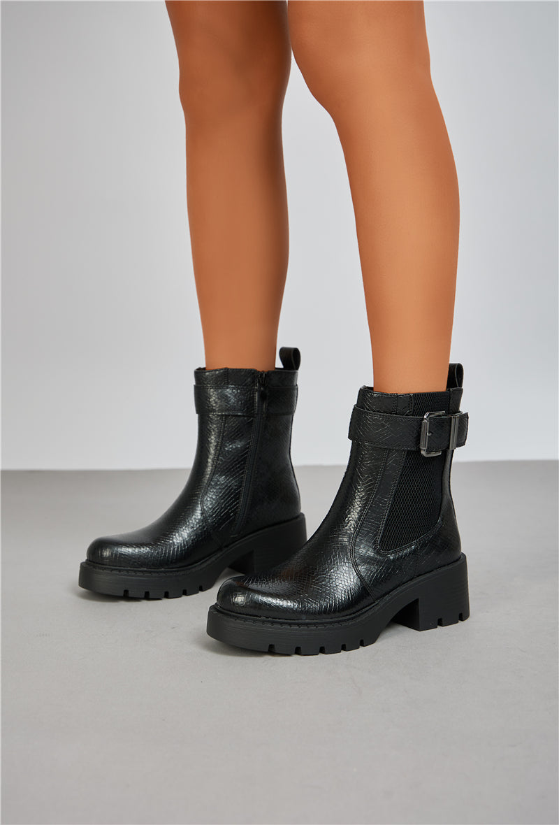 Bottines Chelsea avec boucle et semelle crantée, Noir