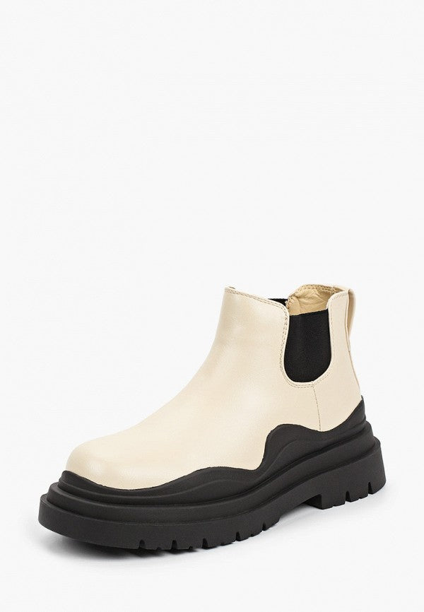 Bottines beiges à semelle crantée