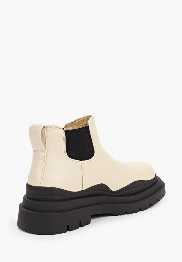 Bottines beiges à semelle crantée